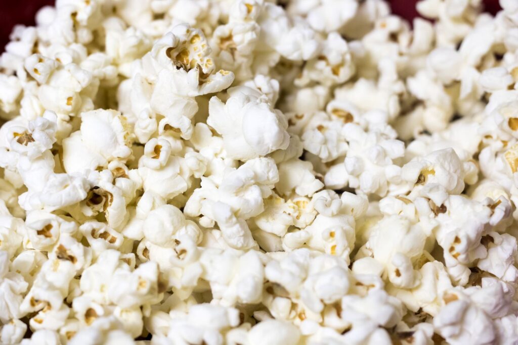 Close-up of fluffy white popcorn, a naturally gluten-free whole-grain snack, filling the frame